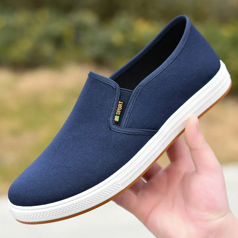 Men's black and blue canvas slip-on shoes with round toe and composite sole