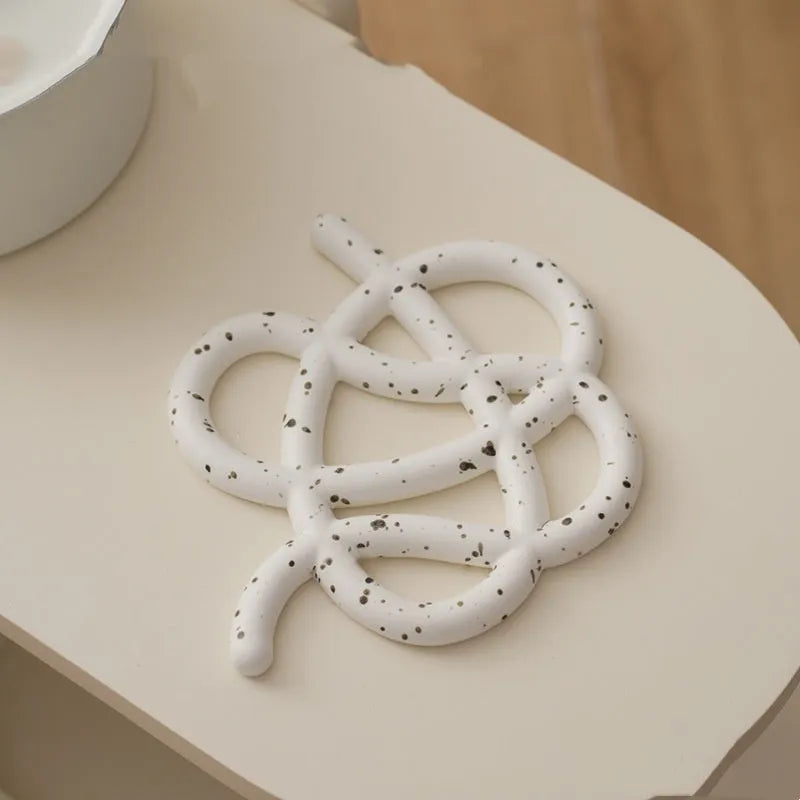 Ceramic heat proof mat in modern simplicity design with irregular shape