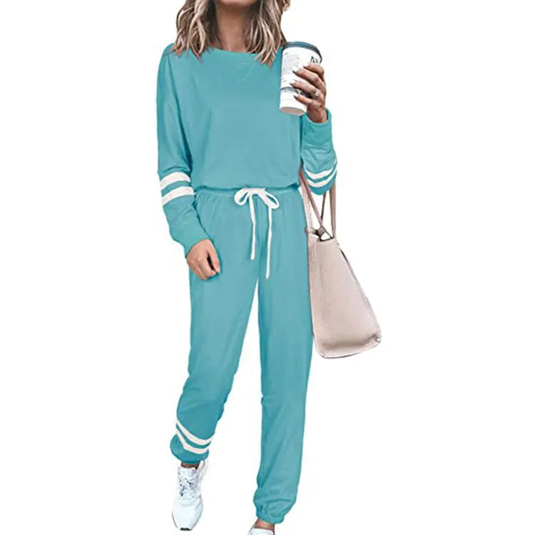 Women's plus size casual suit set with loose-fitting long sleeve top and trousers in solid colour