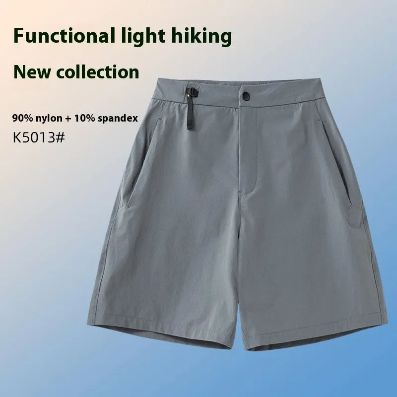 Men's khaki quick-drying sports shorts with elastic waist and 3D cut design for running and outdoor activities.