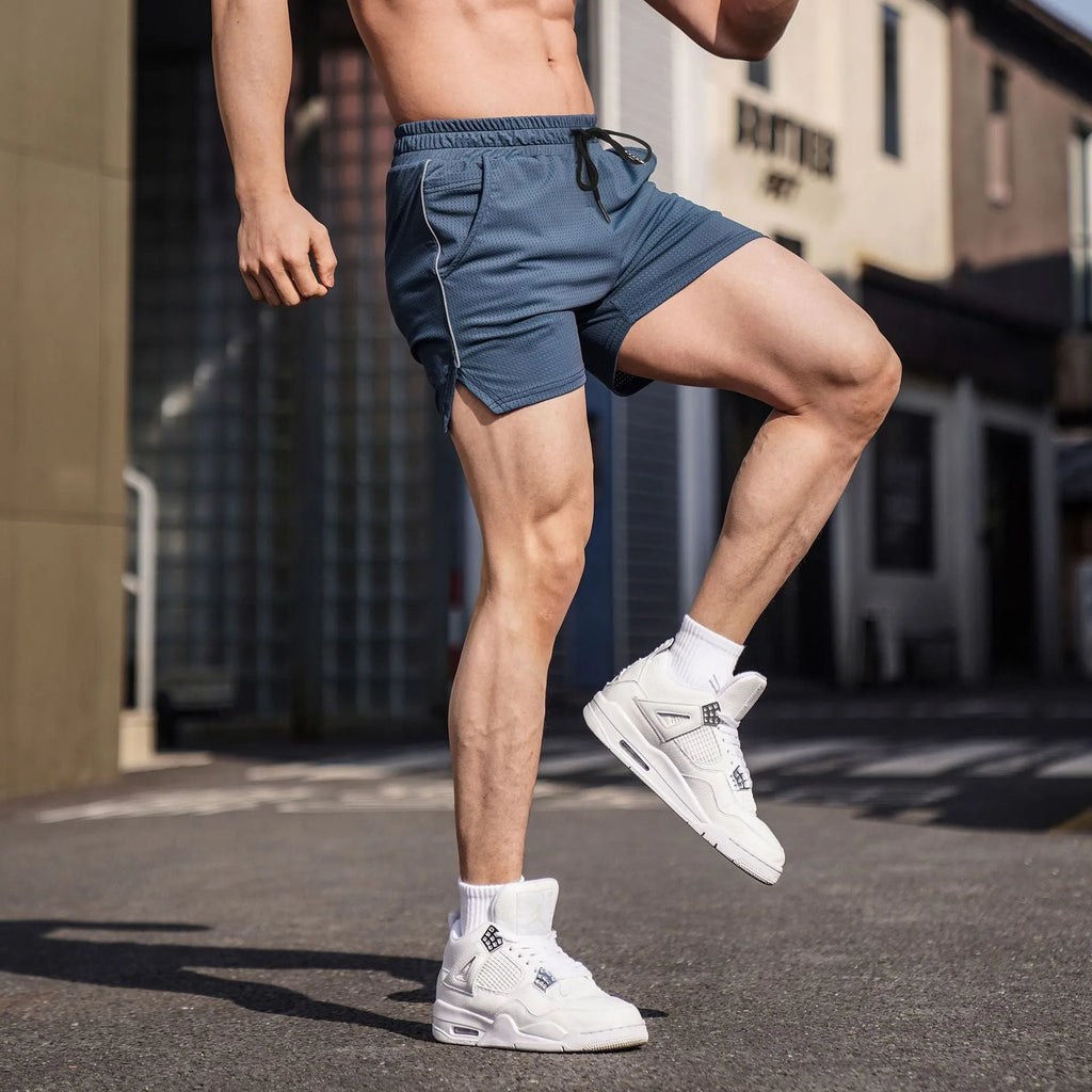 Men's black polyester sports shorts with straight-leg design for fitness and casual wear