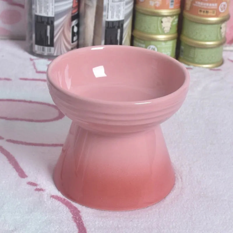 Ceramic pet bowl with high foot design showing anti-tumble stability feature