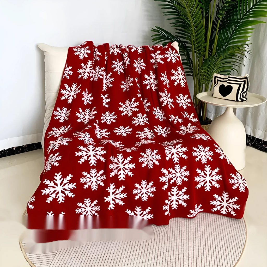 Christmas blanket with snowflake and reindeer patterns in acrylic material