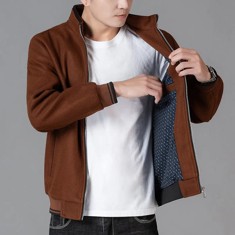 Men's gray polyester fleece autumn coat with long sleeves and side pockets in a sports style.