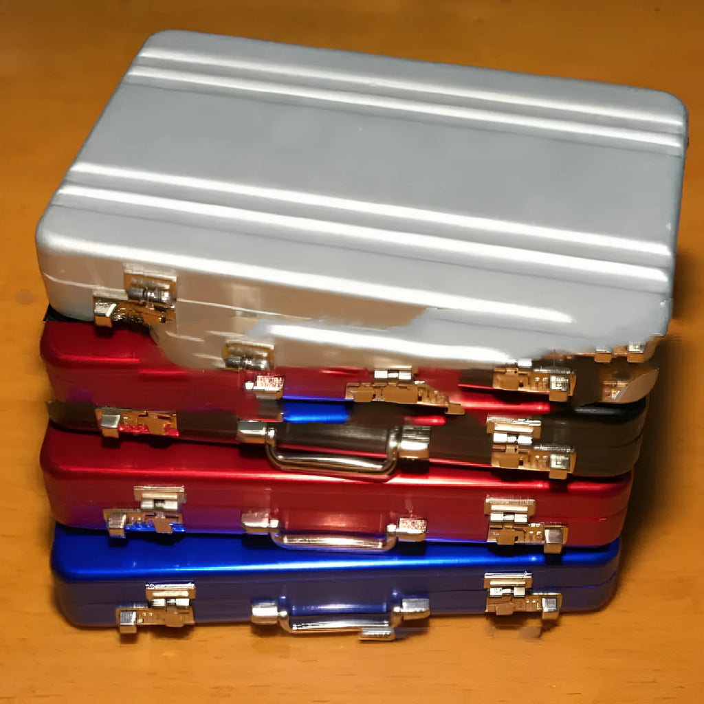 Slim aluminium metal card holder in a choice of six colours showing compact size.