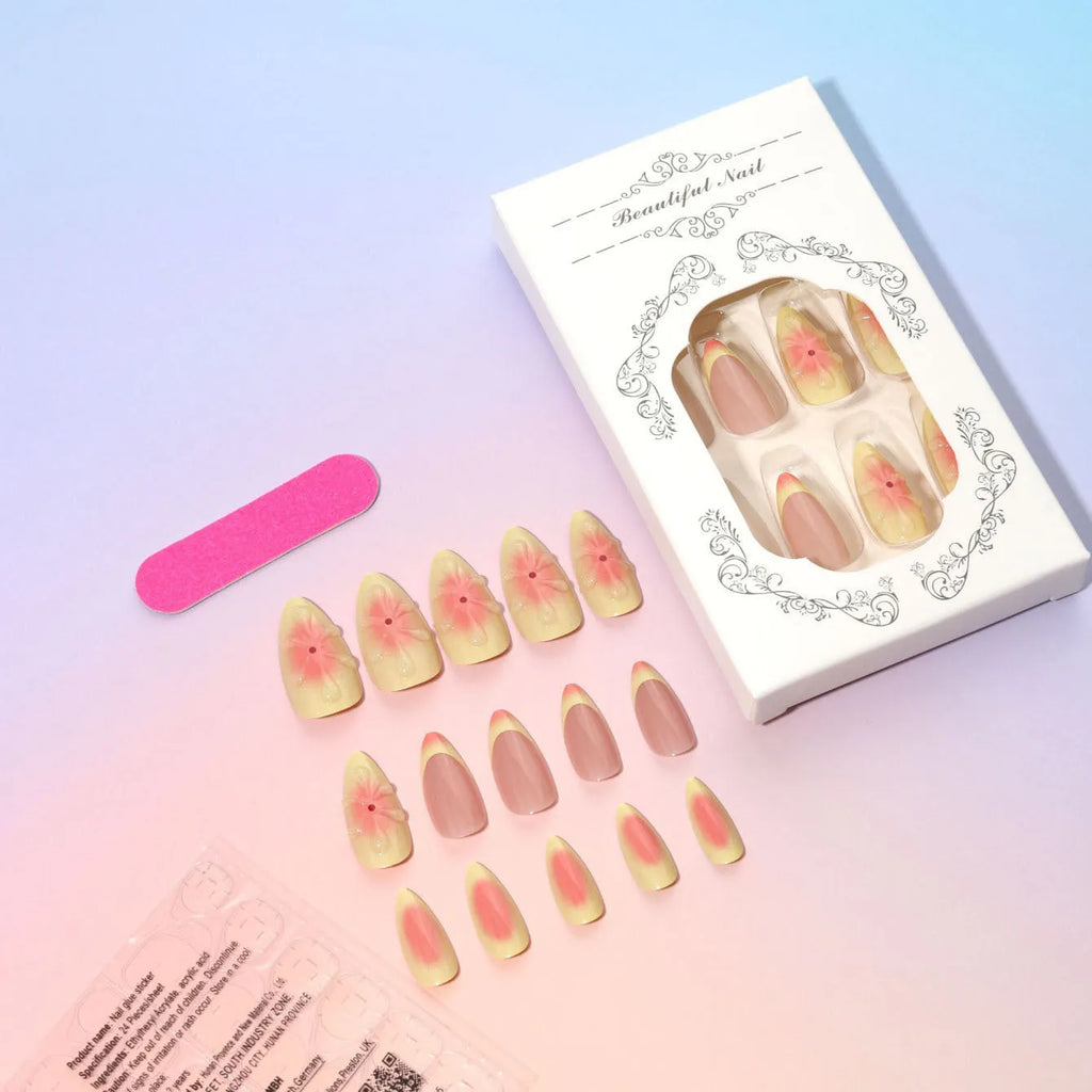 Set of plastic fake nails with 3D raised cartoon flower patterns, jelly glue tube, and a nail filing strip.