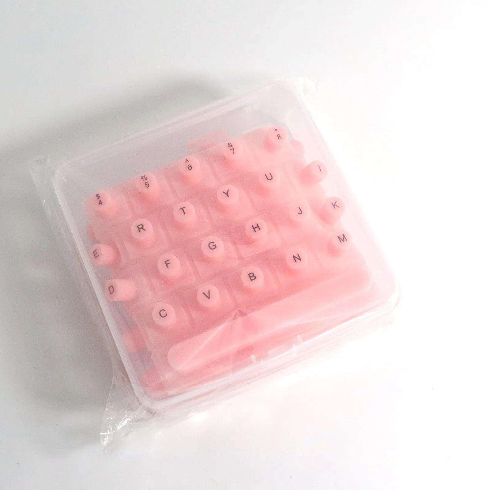 70 anti-static silicone keycaps for long nails in assorted colours including black, clear, mint green, pink, and purple