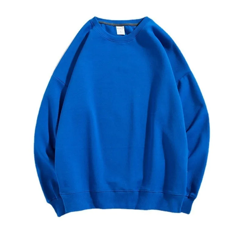 A loose-fitting, off shoulder cotton pullover sweater in a solid colour with long sleeves.