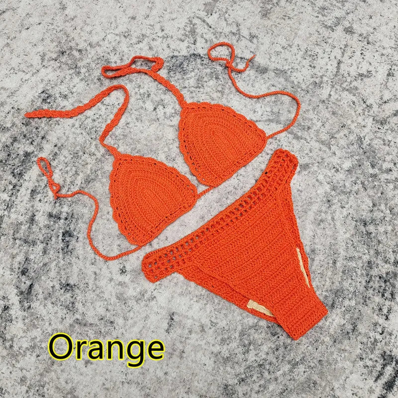 Women's white three-piece swimsuit set with bikini and crochet beach skirt on a mannequin.