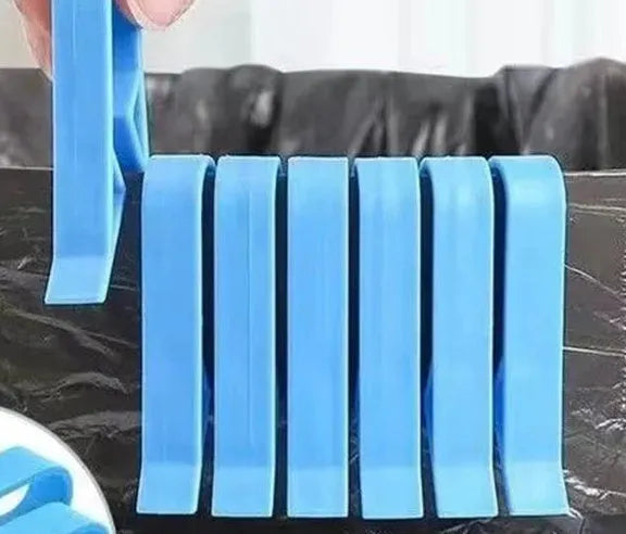 Grey PP plastic garbage bag fixing clip attached to bin side holding liner securely
