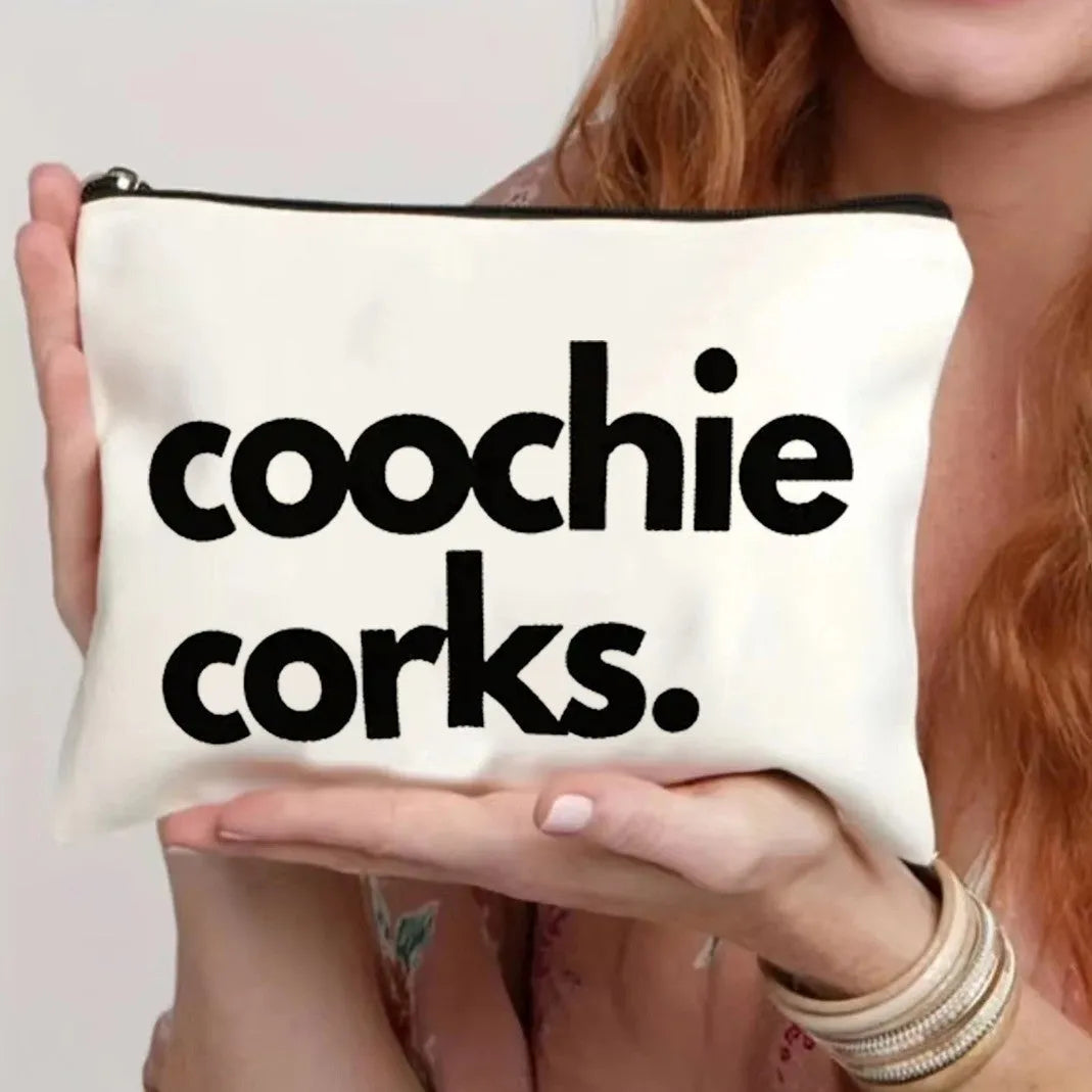Lightweight canvas cosmetics bag with central zipper, shown in one of five available colours.