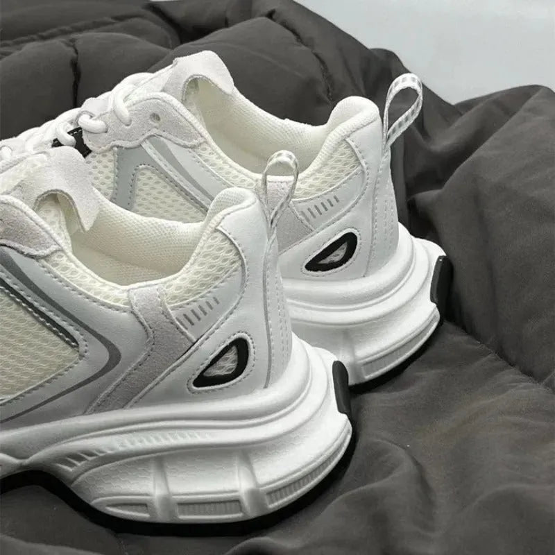 Beige women's mesh platform sports shoes with a wedge heel and lace-up front.