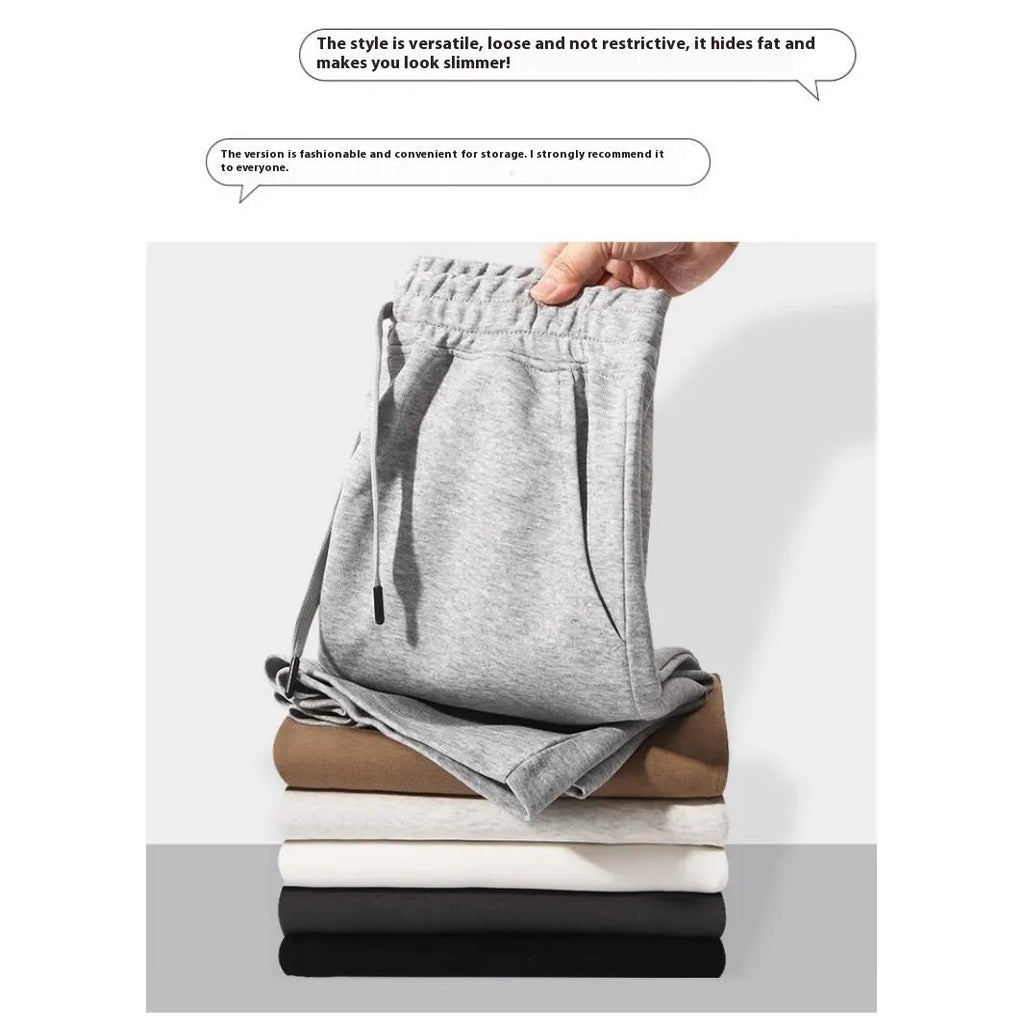 Cotton micro-elastic straight leg summer shorts for men and women on a neutral background.