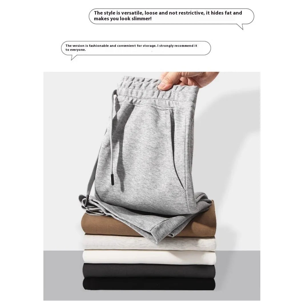 Cotton micro-elastic straight leg summer shorts for men and women on a neutral background.