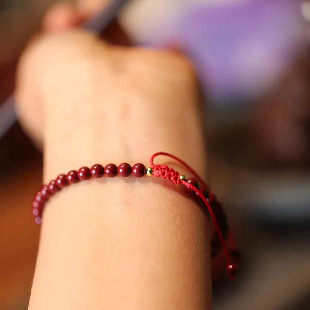 Natural cinnabar bracelet with purple gold sand design and geometric auspicious patterns