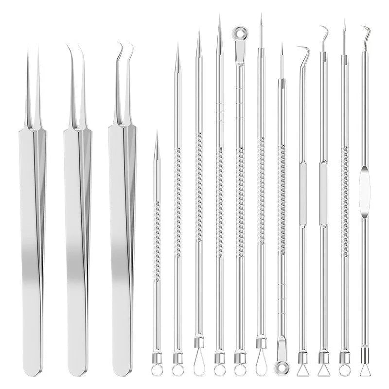 Four metal acne needles with ultra-fine pointed tips laid out in a set.