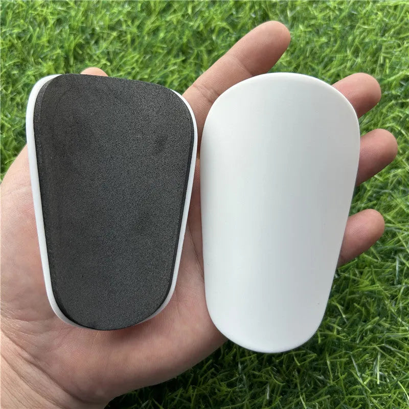 Extra small mini football shin guards in 8x5cm plastic construction