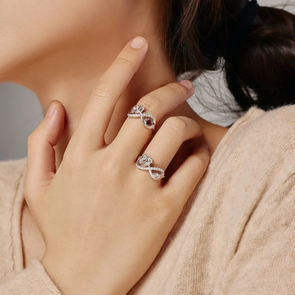 Silver geometric ring with rose red electroplated finish featuring new baby footprints design