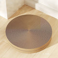 Round green cat scratching board with corrugated paper insert measuring 55cm diameter with two replacement refills