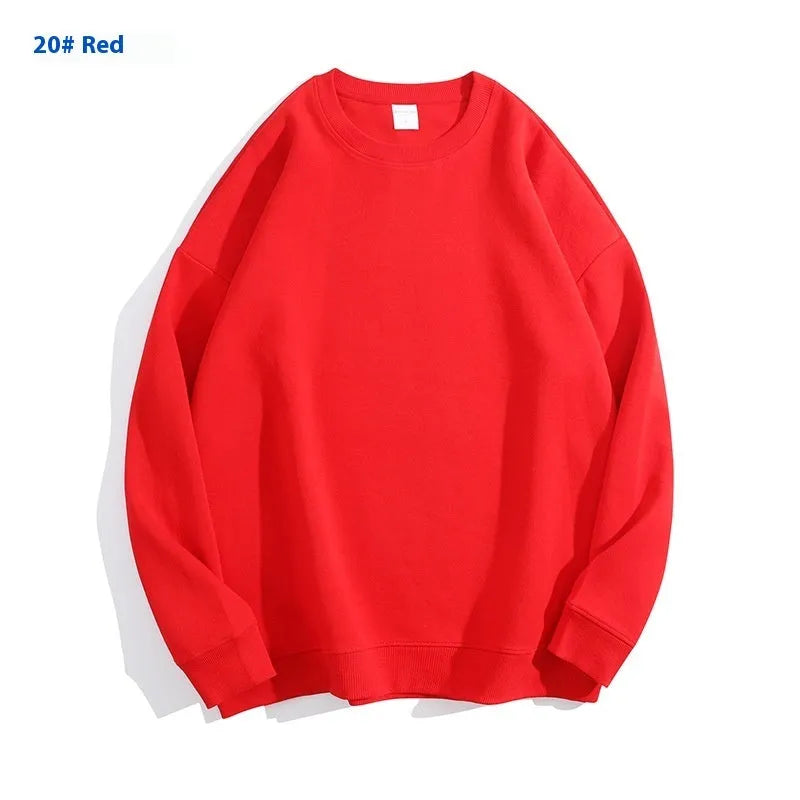 A loose-fitting, off shoulder cotton pullover sweater in a solid colour with long sleeves.