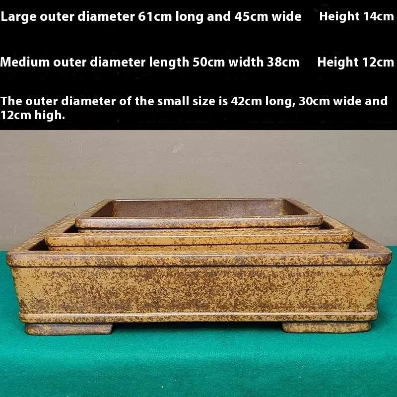 Straight shallow rectangular Yixing Zisha flowerpot made of purple sand clay.