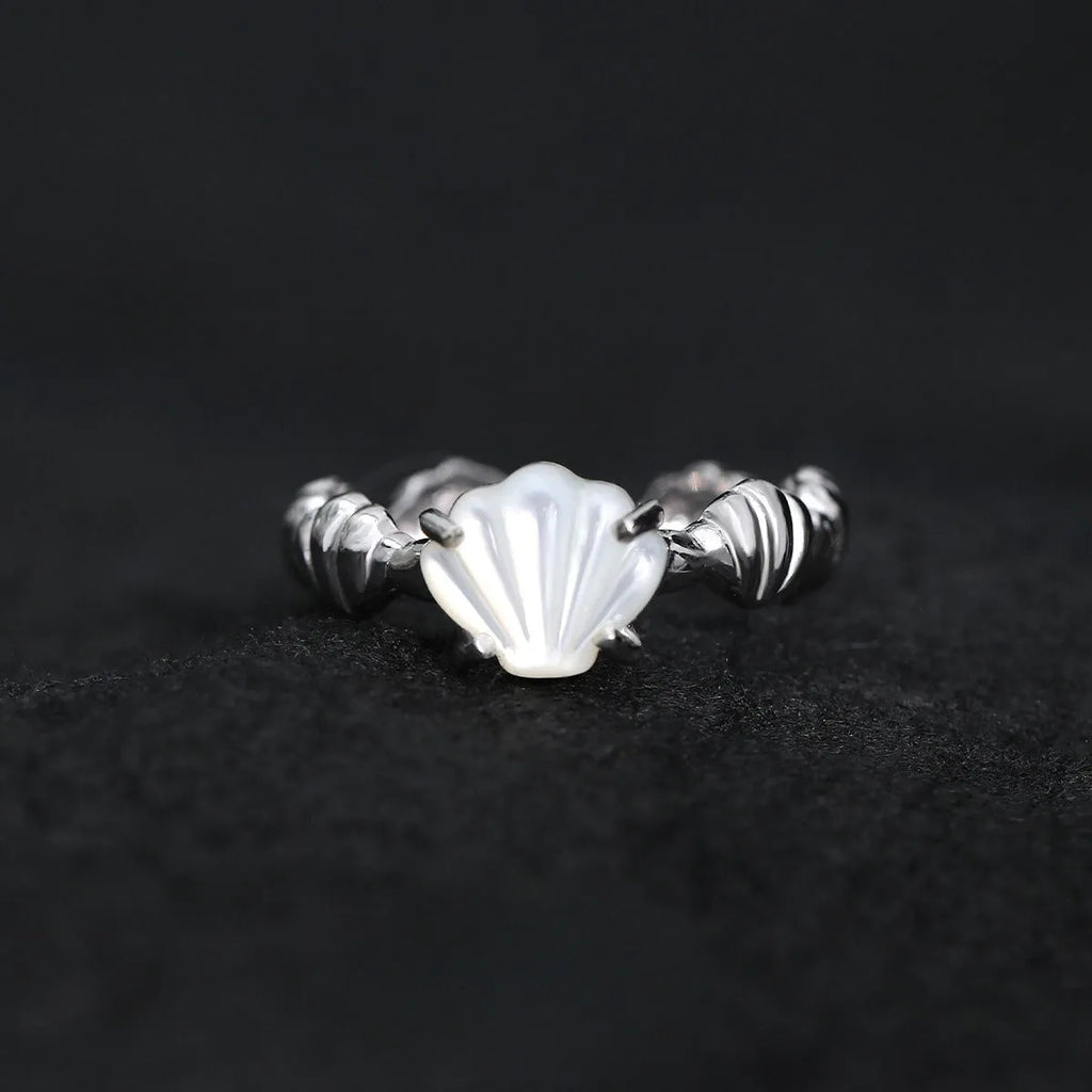 Women's adjustable silver ring with natural shell and tiger eye stone in cold-style design