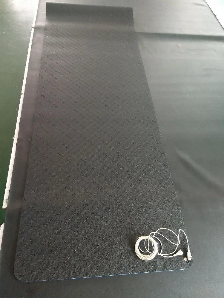 Blue conductive yoga mat with plants and flowers pattern, measuring 182x61cm with grounding wire