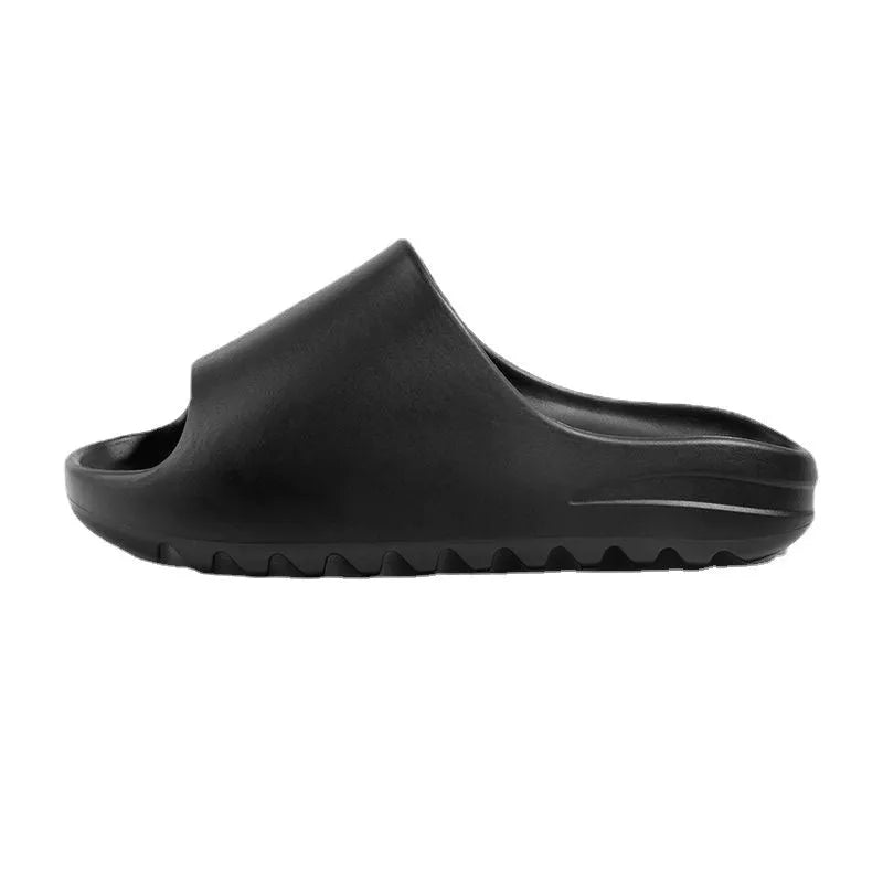 Women's thick sole beach slippers in black, green and brown colours with EVA injection moulded construction