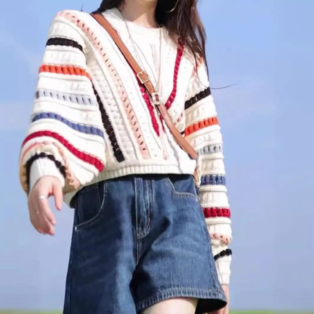 Women's rainbow striped hollow knit sweater with batwing sleeves and round neck in loose fit