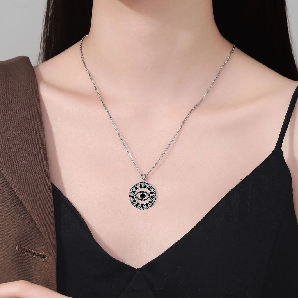 Copper Devil's Eye pendant necklace with electroplated finish and cross chain for women.