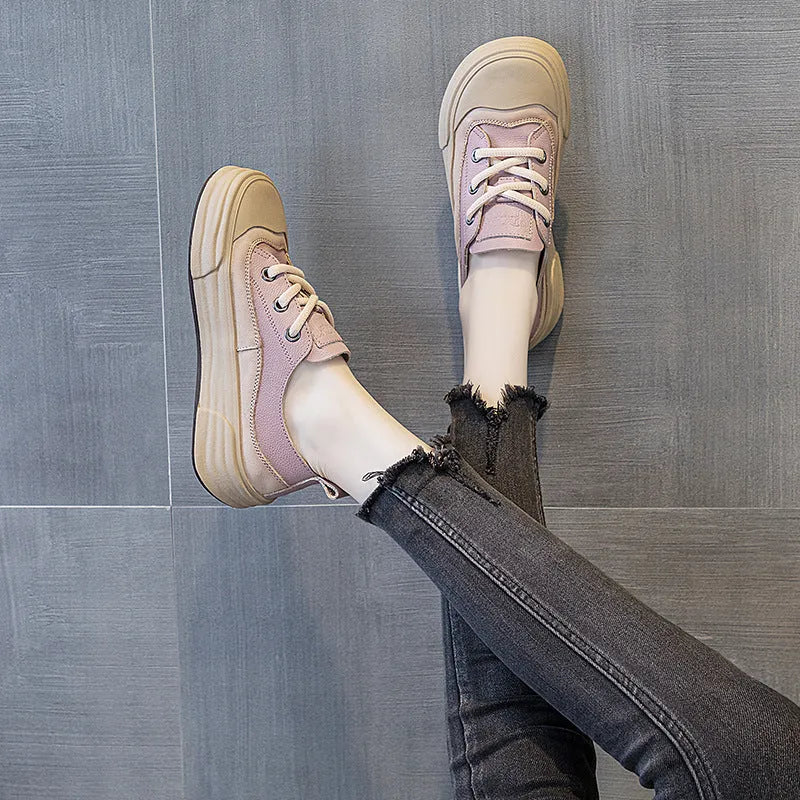 Women's leather low-top platform sneakers in matcha green, purple, and orange colours with front lace-up.