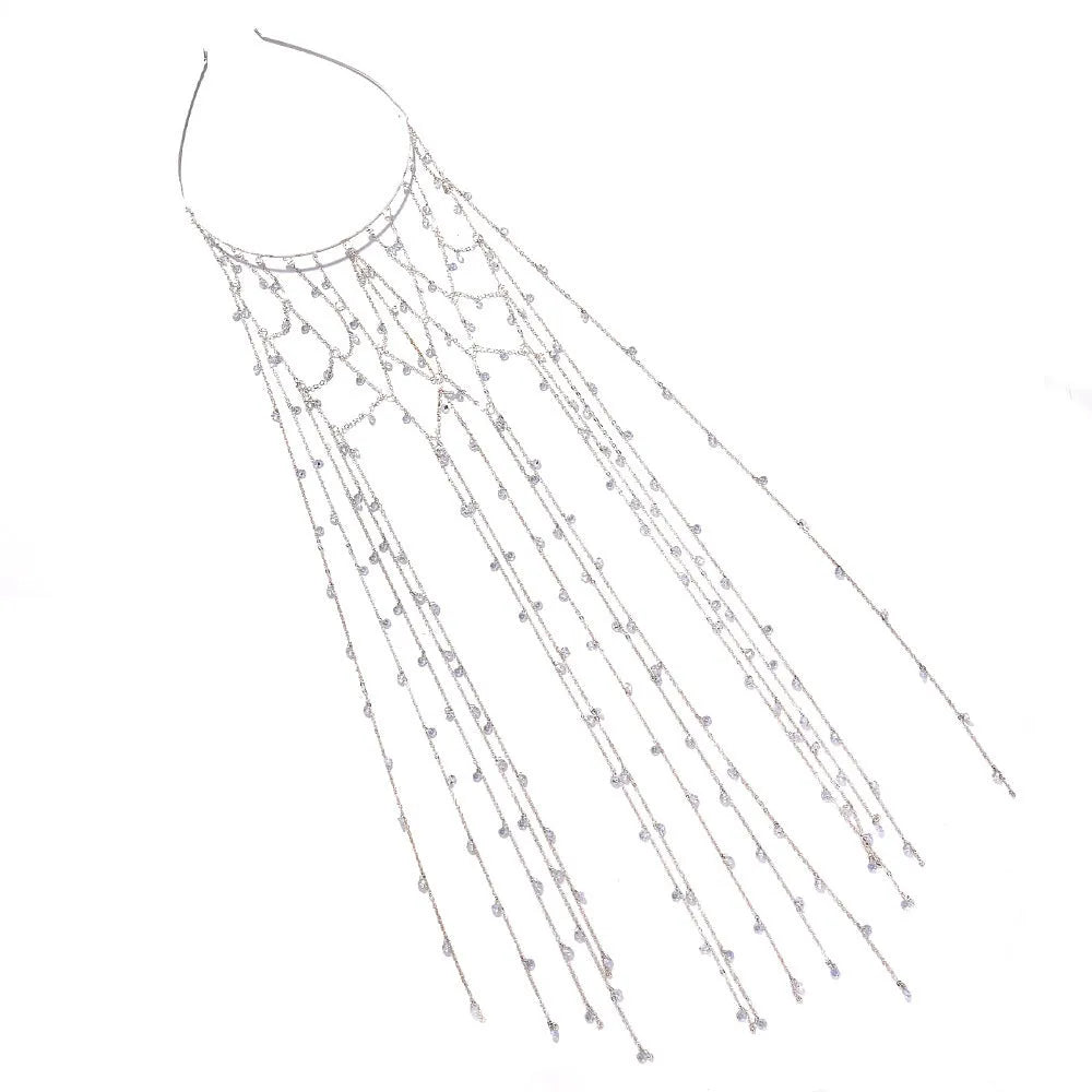 Gold and silver mesh headband with rhinestones and a decorative tassel on an adjustable band.