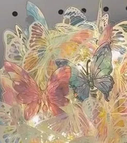 Butterfly night lamp with glass lampshade and raw wood base measuring 12x15cm