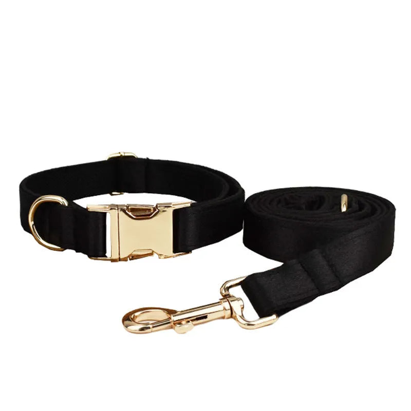Complete dog accessory set showing collar, leash, bow and vest in cloth material