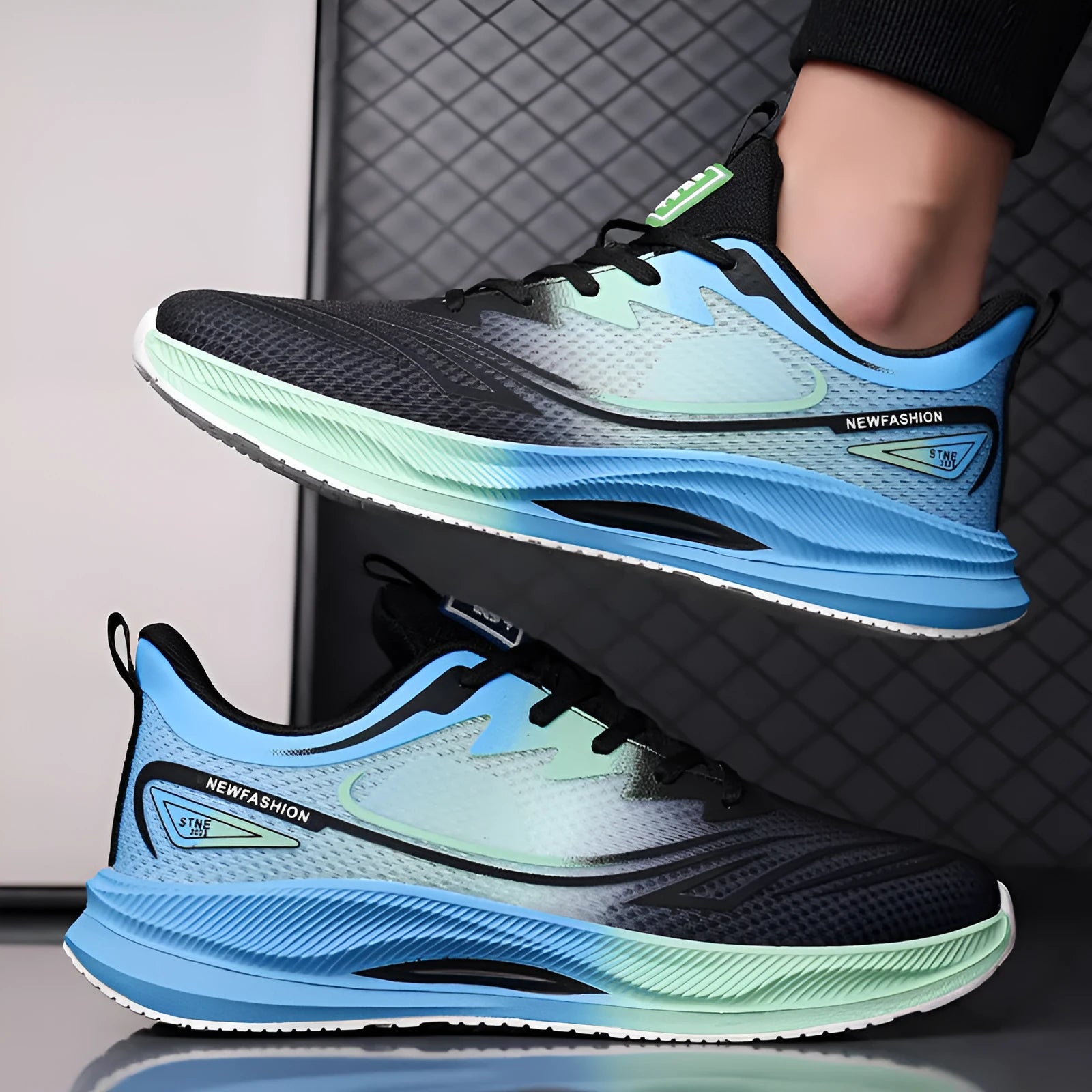 Men's low-top casual shoes in grey green with woven mesh upper and rubber sole.