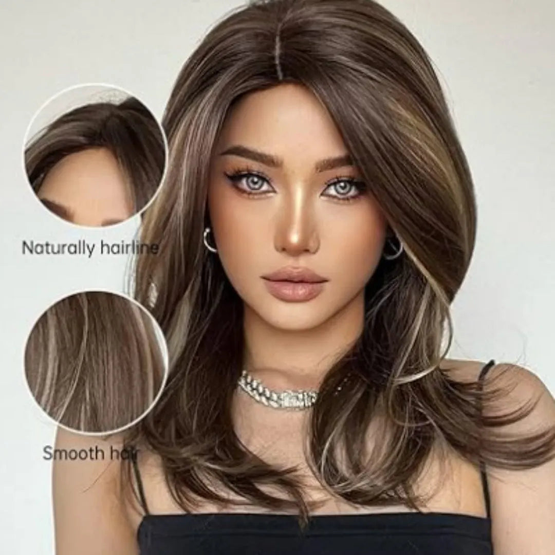Mid-length curly synthetic wig with gradient colour and long bangs on a wig stand.