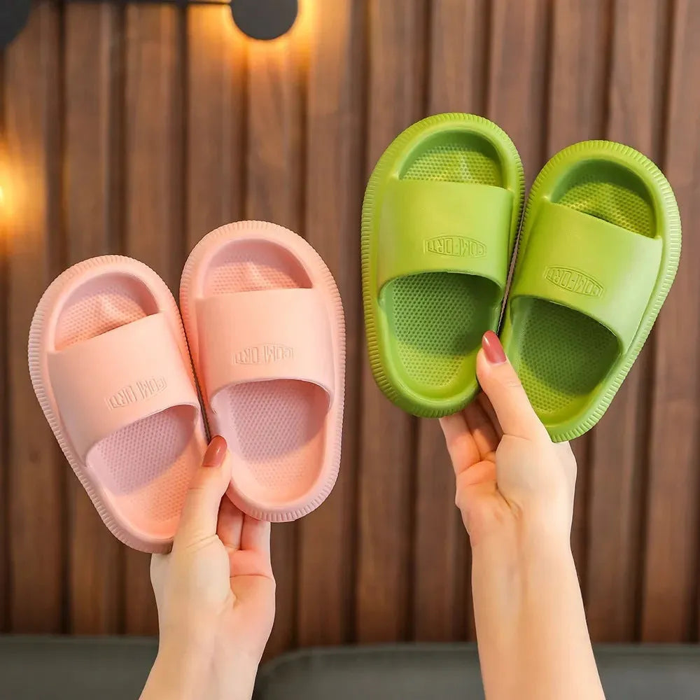 Children's EVA slippers in bright colours with non-slip soles, showing size options from 15.5cm to 21.5cm