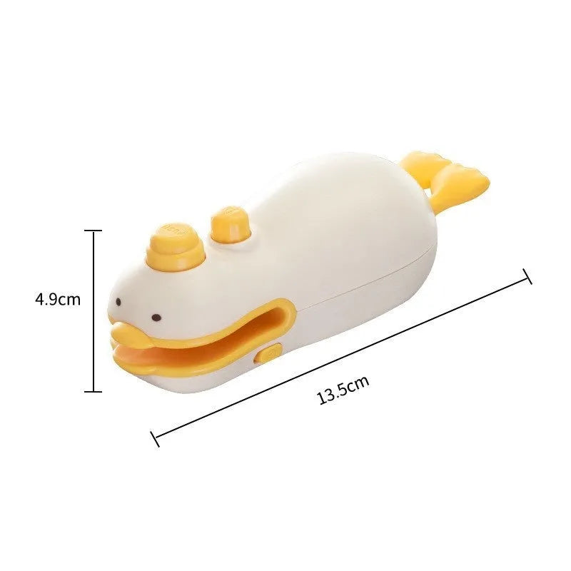 Small yellow duck animal jacquard style rechargeable handheld plastic bag sealing machine with charging cable.