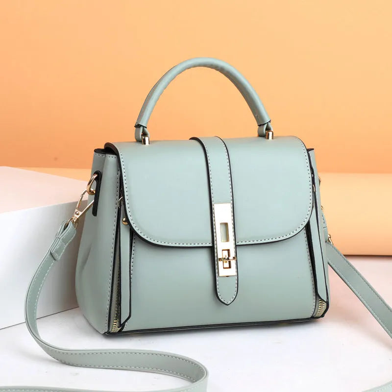 Soft leather women's messenger bag in square vertical design with shoulder strap