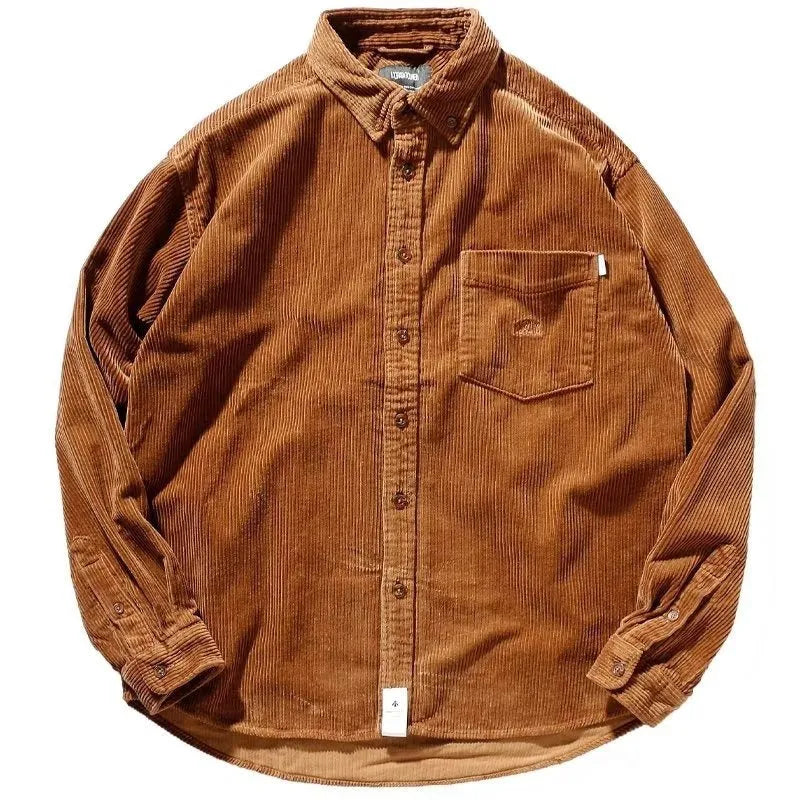 Men's loose fit corduroy cardigan shirt in caramel colour showing textured fabric and long sleeves