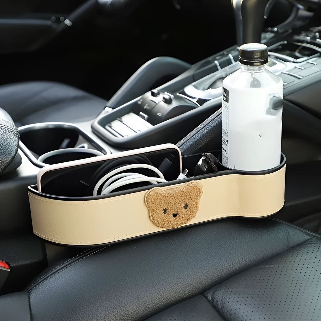 Leather car seat gap storage box with cartoon bear design in black or beige filling the console gap