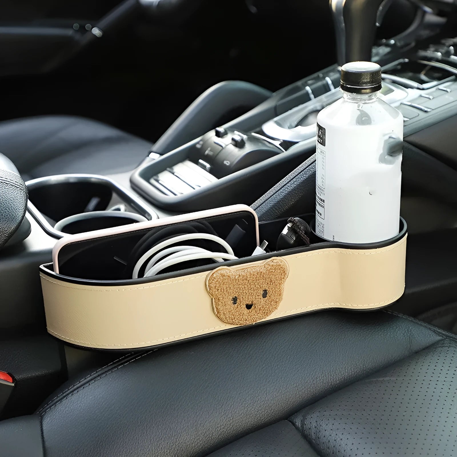 Leather car seat gap storage box with cartoon bear design in black or beige filling the console gap