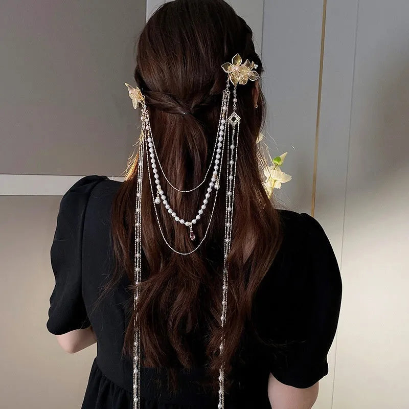 Women's hairpin with pearl, diamond and flower decorations featuring long tassel design and gold-colour grip