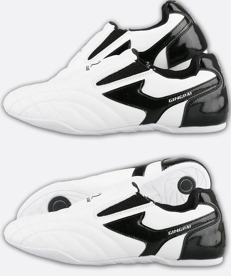 Black and white children's martial arts shoes with soft sole and widened fit for boxing training