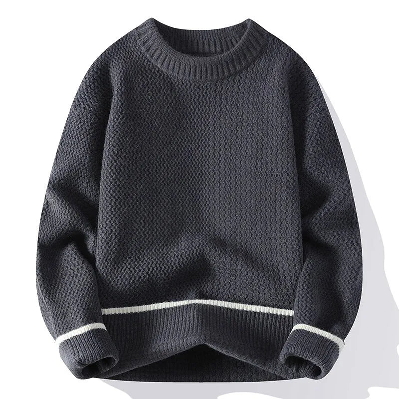 A man's grey loose-fit round-neck long-sleeve casual pullover sweater on a plain background.