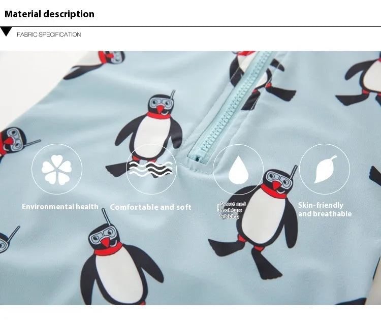 Boy's blue penguin print long sleeve swimsuit top and shorts with matching swimming cap.
