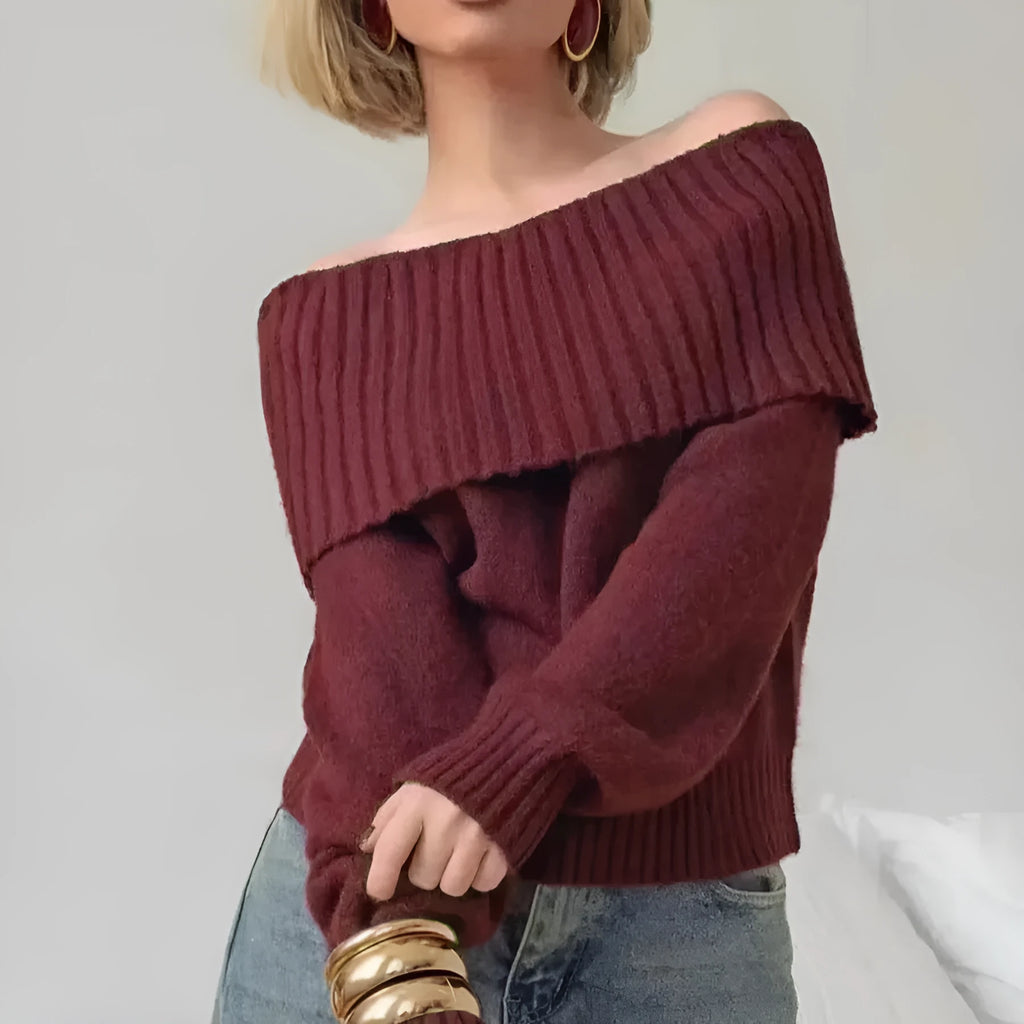 Grey strapless off-the-shoulder acrylic sweater with a 3D pattern, shown as a pullover.