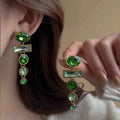 Green gradient geometric alloy earrings with tassel design and inlaid zircon detailing