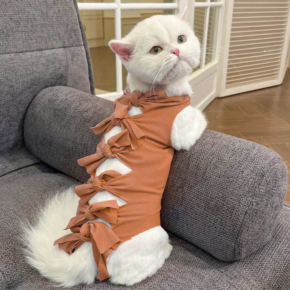 Adjustable lace-up cat sterilisation clothing in polyester fabric showing closure system and colour options