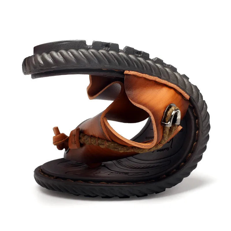 Men's dark blue herringbone pattern outdoor slippers with leather lining and a rubber sole.